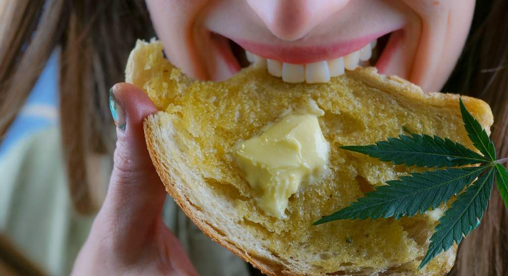 a weed butter recipe: eating morning toast with cannabis-infused butter on top
