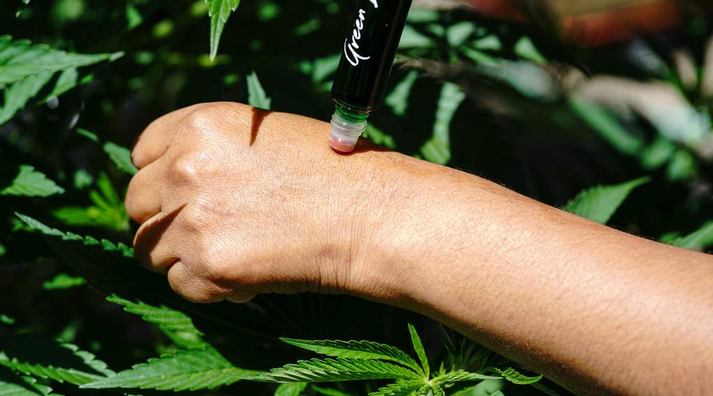 easily using a cannabis roll-on topical for arthritis pain