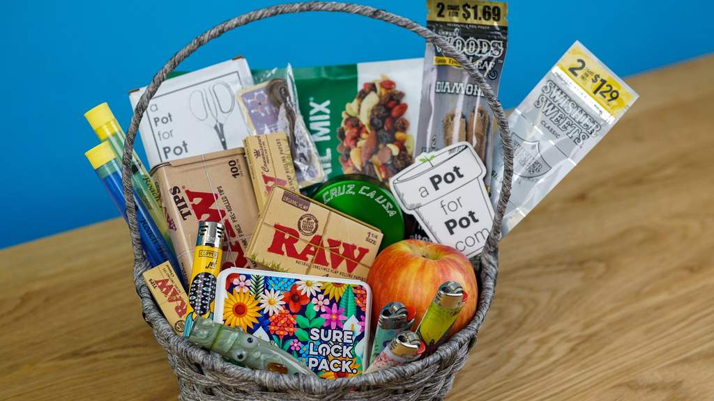 non thc weed gift basket with rolling papers, lighters, snacks, blunt wraps, grinder