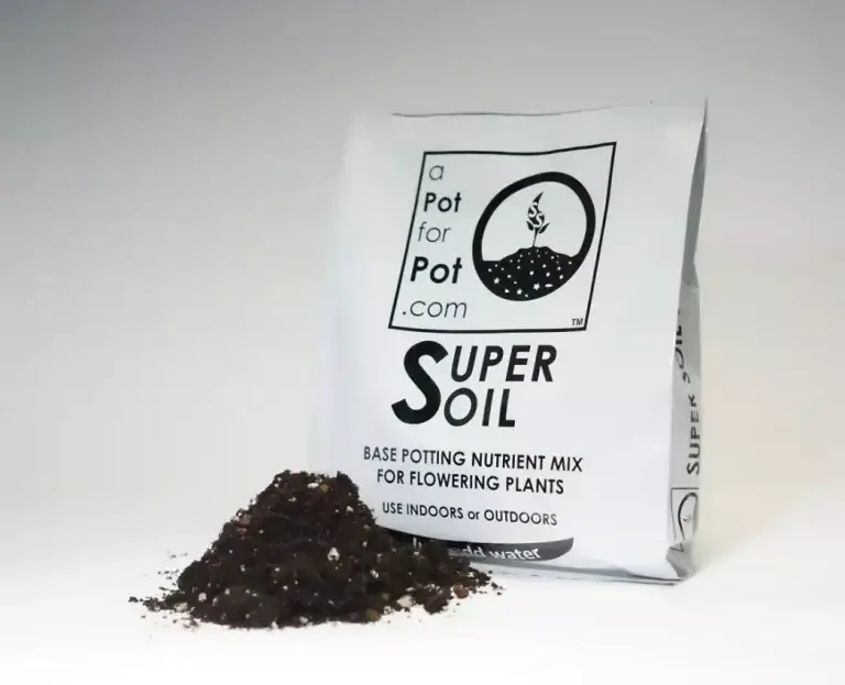 Bag of Superb Soil with a pile of dark living soil in front